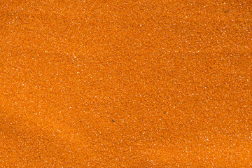 Orange emery paper full frame shot background texture