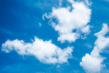 Naklejka na ściany i meble Photo of a blue sky with clouds. Background blue sky. White clouds.