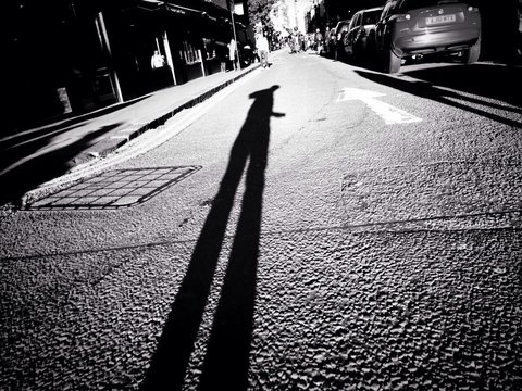 Shadow Of A Person On Ground