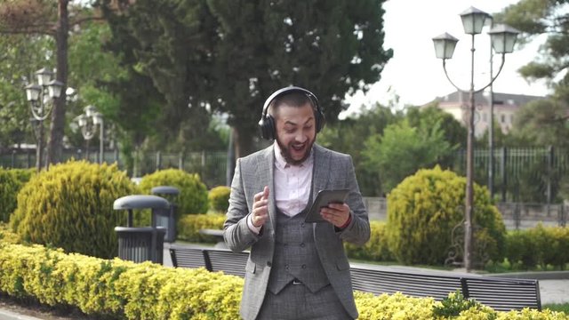 The businessman won a jackpot and he is very happy