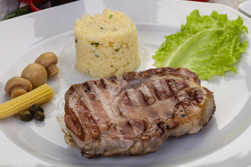 Grilled pork neck steak