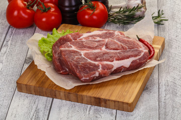 Raw pork neck steak