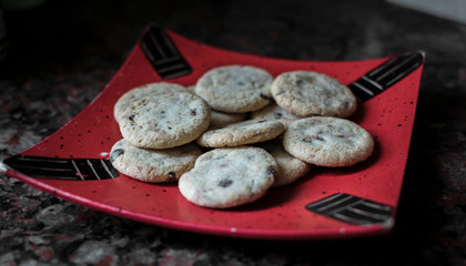 crackers served on a red plate
