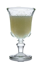 Jade green absinthe in a glass