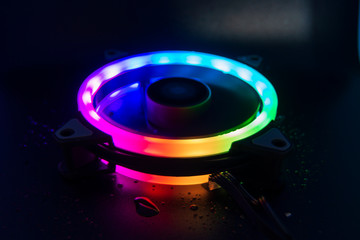 RGB light computer fan on a black background