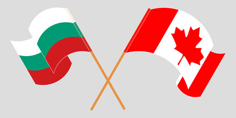 Crossed and waving flags of Bulgaria and Canada