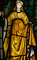 Stained Glass Window with Robed Woman