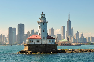 Chicago skyline behind lake michigan lighthouse © DesiDrew Photography