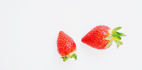 Fresh juicy strawberries isolated over white blackground