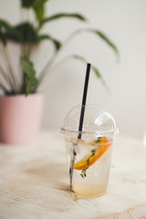 refreshing clear drink with ginger and ice