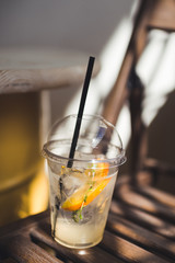 refreshing clear drink with ginger and ice