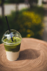 Coconut milk matcha drink with ice