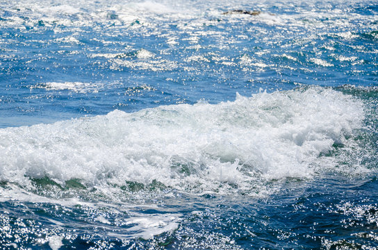 Seascape background white wave on blue sea © Annuitti