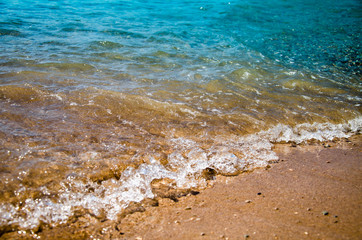 Seascape background colorful sand beach and sea waves