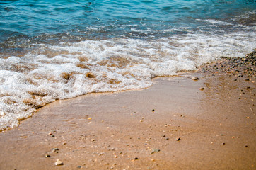 Seascape background colorful sand beach and sea waves