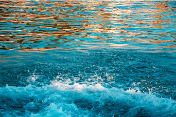 Sea abstract background colorful ripple and splash on water surface