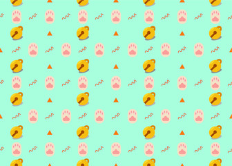 Kitten claw with yellow small bell seamless pattern on light blue background.
