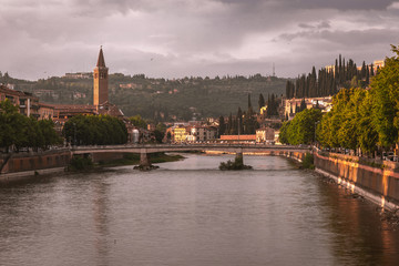 Verona, a view from the Ponte Navi bridge on the river, towards the Basilica of St. Anastasia