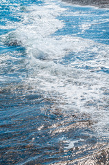 Seascape background white waves on coast