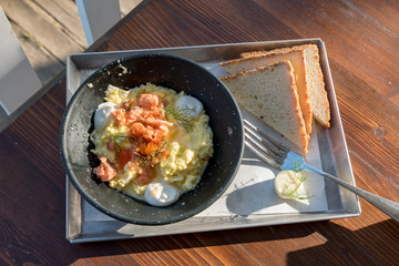 Scrambled eggs with salmon and chives