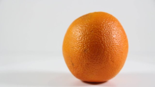 A close up of a bowl of oranges