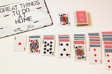 to do at home solitaire game on white background motivation for quarantine