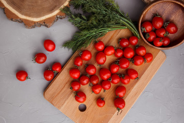 cherry tomatoes on wooden background