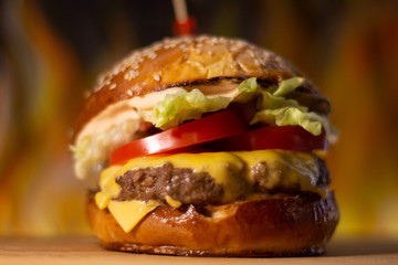 Meat burger with cheese. Fast food.