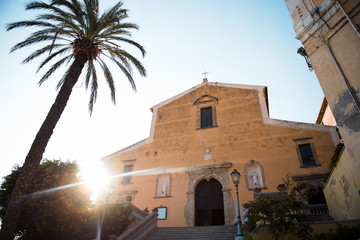 Fototapeta premium Old cathedral church with up stairs at sunset. Amantea, Calabria in Italy