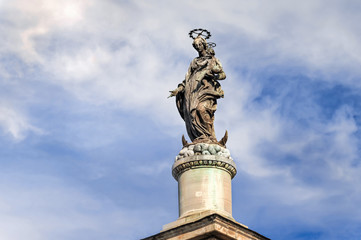 Fototapeta premium Saint Mary statue in front of Papal Basilica of Saint Mary Major in Rome, Italy.