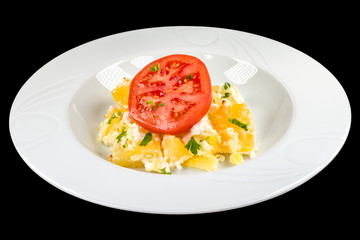 Tasty Gratin with Potatoes in white plate, isolated on black background