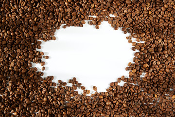 Naklejka premium Coffee beans on a white background