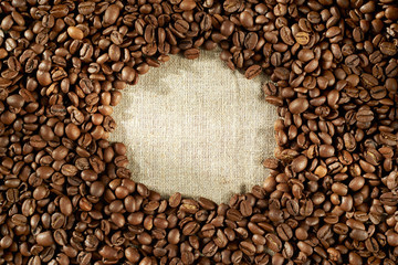 Grain coffee on burlap close up