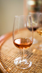 Closeup macro view on a glass of port wine on the table, at the restaurant