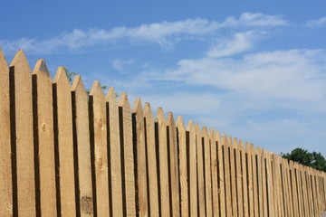 wooden fence on blue sky