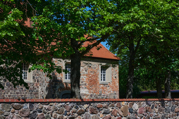 Side view of a medieval village church in the state of Brandenburg, Germany.