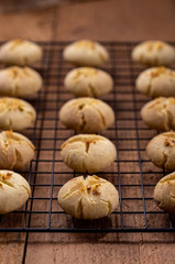 Freshly baked nankhatai are on a tray, Nankhatai are shortbread biscuits, originating from the Indian subcontinent, popular in Northern India and Pakistan.