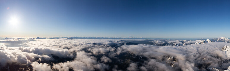 Aerial Panoramic View of Remote Canadian Mountain Landscape during sunny morning. Located near Vancouver, British Columbia, Canada. Nature Panorama Background. Authentic