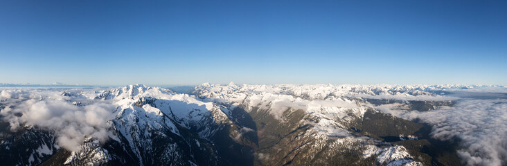 Aerial Panoramic View of Remote Canadian Mountain Landscape during sunny morning. Located near Vancouver, British Columbia, Canada. Nature Panorama Background. Authentic