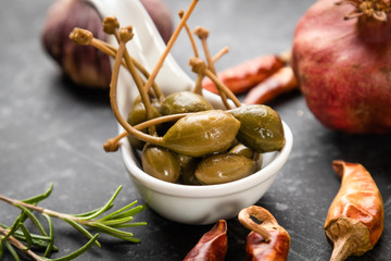 Pickled green capers close-up