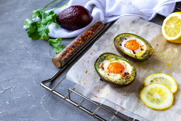 baked egg in avocado Boats. Copy space