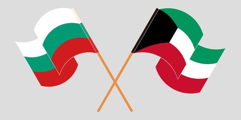 Crossed and waving flags of Bulgaria and Kuwait