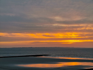Awe sunset from Norderney behind juist