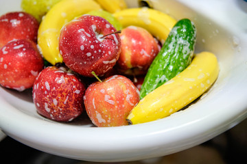Apple close-up with foam. Wash fruit with soap to protect from bacteria and viruses.