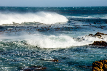 waves crashing on rocks
