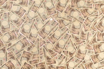 Japanese money - background with several notes of ten thousand yen (front). 10,000 yen notes. Concept: financial abundance. Horizontal shot.