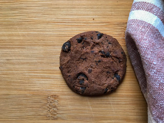 homemade chocolate chip cookies on wooden background