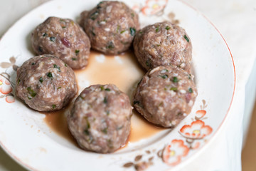Preparation of meat for cooking meatballs