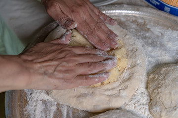 Cooked dough lies on flour for further baking