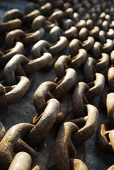 Tangle of old rusty chain.